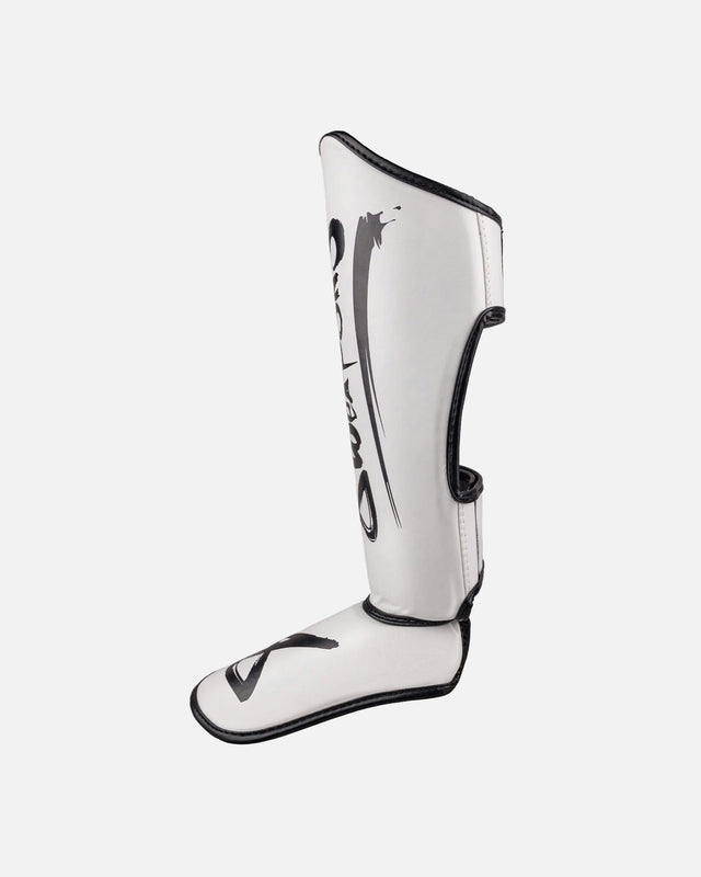 Espinilleras 8 WEAPONS Unlimited 2.0 – Blanco/Negro