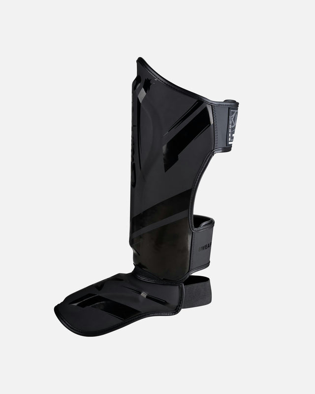 Espinilleras 8 WEAPONS Shift – Negro