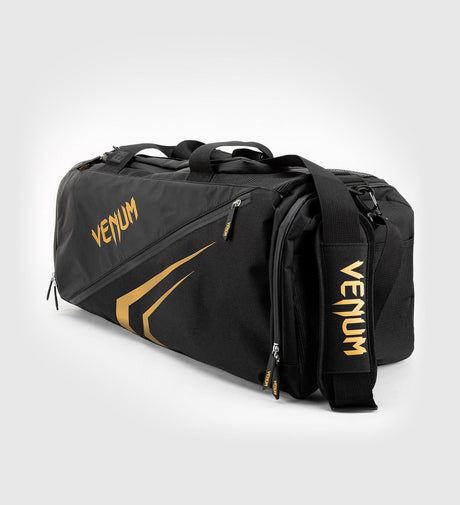 Sportovní taška Venum Trainer Lite Evo – Černá/Zlatá – Sportovní taška